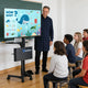 TheDisplayOutlet NexusX Rolling TV Stand with Laptop Shelf for 32 to 65in Screen Image